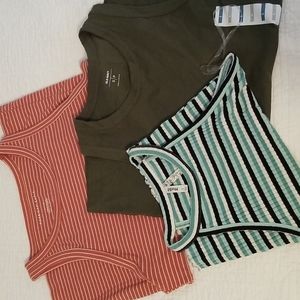 Three sleeveless shirts